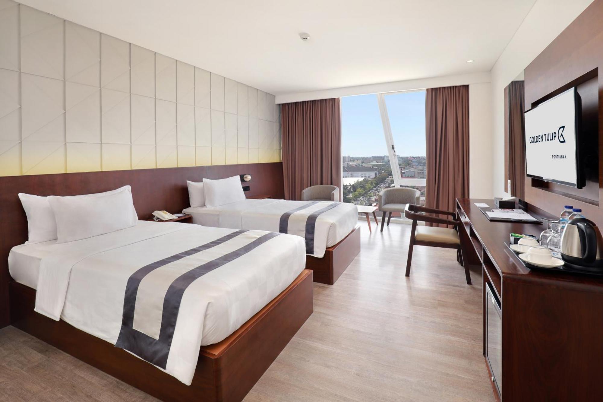 Отель Golden Tulip Понтианак Экстерьер фото